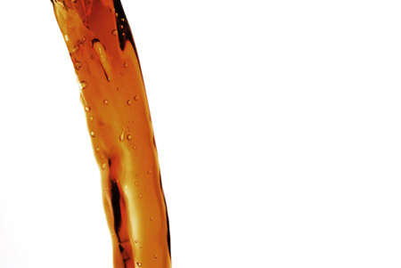 Pouring coffee on a white backgroundの写真素材