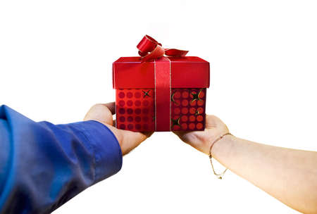 Two people offering a gift to someoneの写真素材