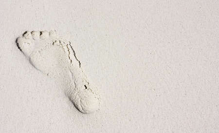 One footprint on sand of a beautiful beachの写真素材