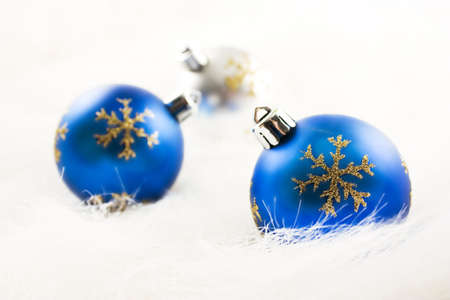 Three Christmas ball isolated on a white harry surfaceの写真素材