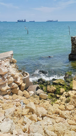 The embankment collapsed due to seawater abrasionの写真素材