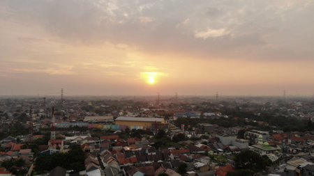 Aerial view of sunset over the cityscaoeの写真素材