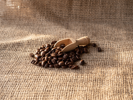 coffee beans on burlap sackの写真素材