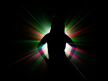 silhouette of woman dancing on abstract backgroundの写真素材