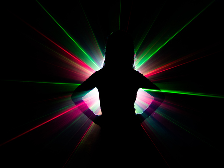 silhouette of woman dancing on abstract backgroundの写真素材