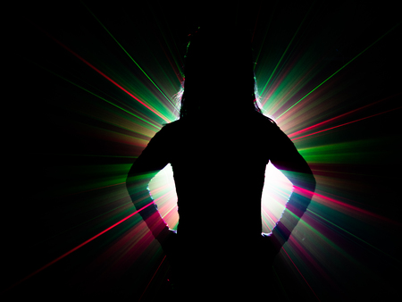 silhouette of woman dancing on abstract backgroundの写真素材