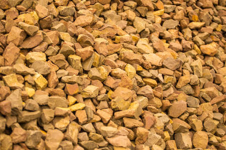Composition of stones on the railway embankment