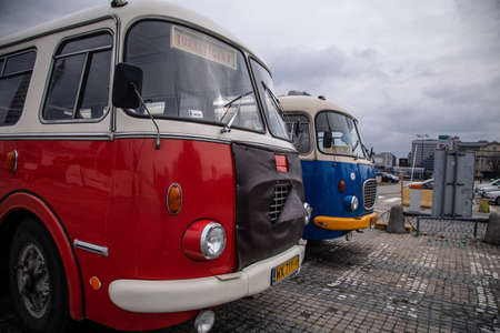 two old buses with the palace of culture in the background. Warsaw Polandのeditorial素材