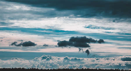 Blue sky with bright cloudsの写真素材