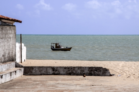 Anchored fisher boat at the beach of Pititinga  Brazil の写真素材