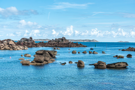 Boulders on the coast near Saint Guirec, at low tide, Finistere department of Brittany (France)の写真素材