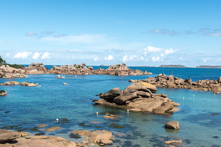 Boulders on the coast near Saint Guirec, at low tide, Finistere department of Brittany (France)の写真素材