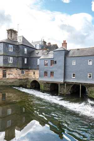 Pont de Rohan, house-lined bridge over the Elorn river in Landerneau, Finistere department of Brittany (France)の写真素材