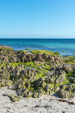 Cliffs on the beach near Plouhinec, Finistere department of Brittany (France)の写真素材