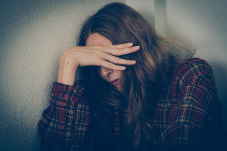 Woman abuse victim. Domestic violence, harassment, depression, drug addiction, human trafficking. PTSD post-traumatic stressの写真素材