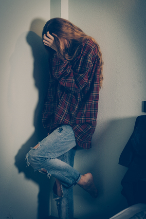 Woman abuse victim. Domestic violence, harassment, depression, drug addiction, human trafficking. PTSD post-traumatic stressの写真素材