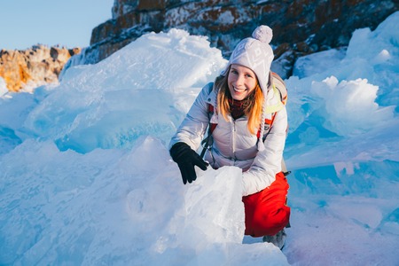 Traveling woman. Winter tourism in Russia Baikal Lake.の写真素材