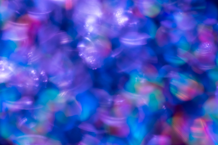 Rainbow blue glitter festive background with bokeh lights. Celebration concept for New Year,...