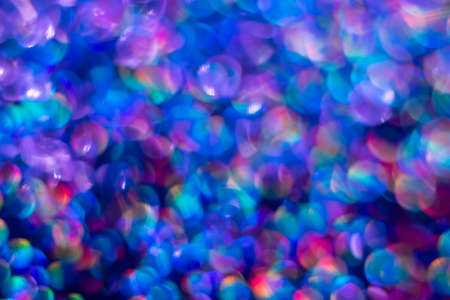 Rainbow blue glitter festive background with bokeh lights. Celebration concept for New Year,...