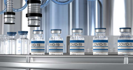 SARS-COV-2  Mass production of vaccine, a machine pours the vaccine, seals bottle caps into ampoules moving along a pharmaceutical conveyor belt in a research laboratory. High quality imageの写真素材