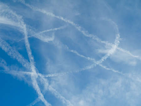 blue sky with clouds and track of planes. High quality photo