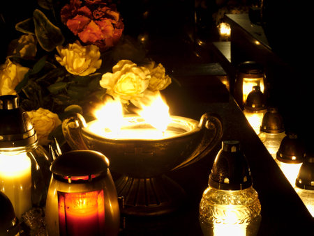 Burning candles on the grave.の写真素材