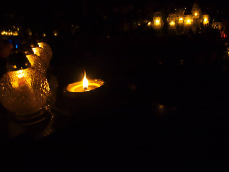 Burning candles on the grave.の写真素材