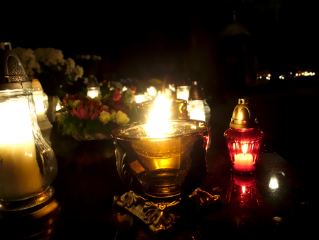 Burning candles on the grave.の写真素材