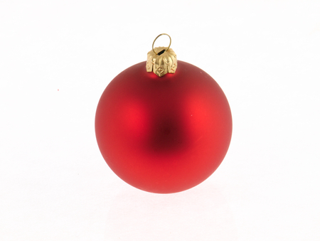 Red Christmas Tree bauble on a white background.の写真素材