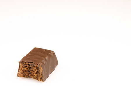 Bitten chocolate Candy-flavored chocolate truffles. On a white background.の写真素材
