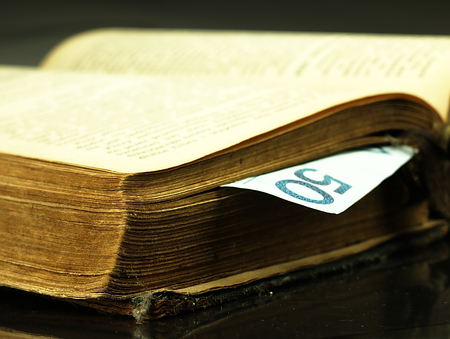 Old book and paper money.