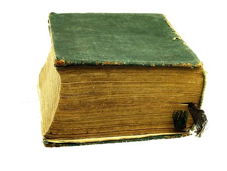 Old closed the book with a damaged cover.の写真素材