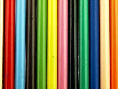 Wooden crayons. The visible spectrum of colors. Arranged in a line.の写真素材