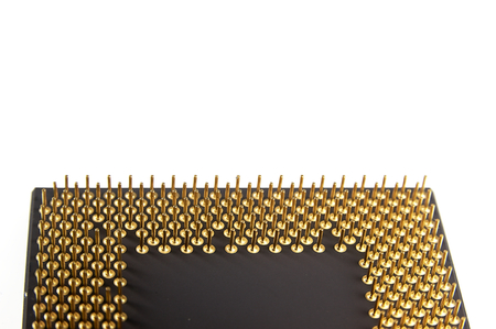 Processor seen from the gold pins on a white background.の写真素材