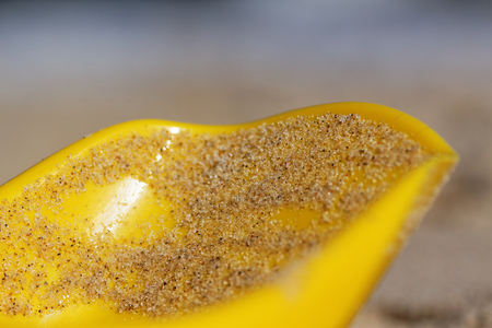 The sea, sandy beach and children's toys.の写真素材