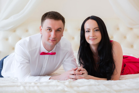 Portrait of a loving couple in bedの写真素材