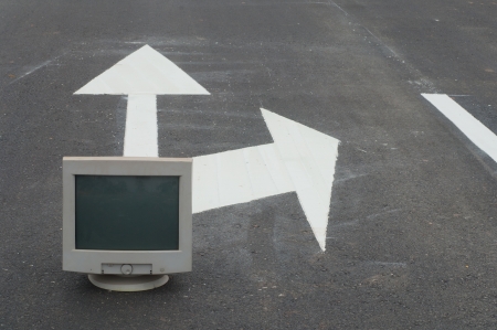 Old computer on the road の写真素材