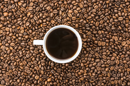 Coffee cup and coffee beans