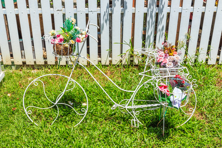flower on a bicycle background lawnの写真素材