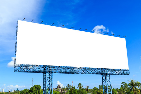 Blank billboard  against blue  sky  ready for new advertisementの写真素材