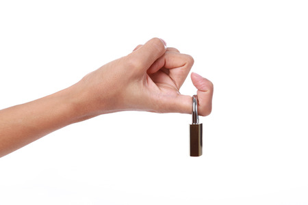 Trigger finger.Hand of female a finger on the lock.