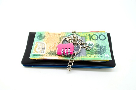 black leather wallet with lock and some banknote, concept for money savings