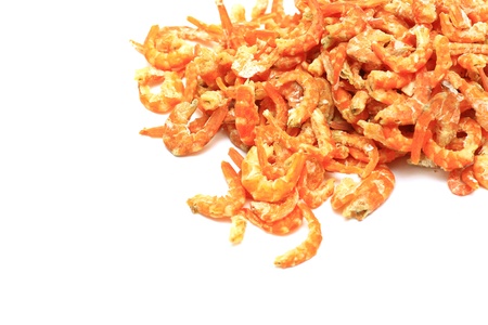 Small dried shrimp for cooking  on a white backgroundの写真素材