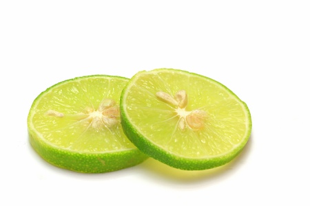 Single cross section of lime  Isolated on white background