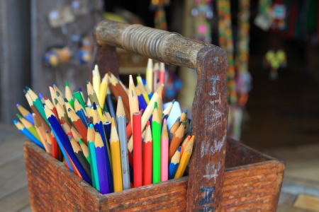 Color pencils in wood basketの写真素材