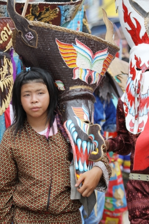 LOEI PROVINCE,THAILAND-JUNE 23:Unidentified men wear ghost costumes at Ghost Festival (Phi Ta Khon- a masked procession celebrated by Buddhist)  Dan Sai district in Loei Province on June 23, 2012. のeditorial素材