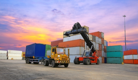 Stack of Freight Containers at the Docks with Truck のeditorial素材