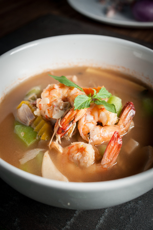 Thai Spicy Mixed Vegetable Soup with Prawnsの写真素材