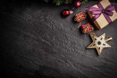 Christmas tree with decoration on dark stone backgroundの写真素材