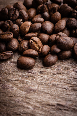 Coffee beans on grunge stone backgroundの写真素材